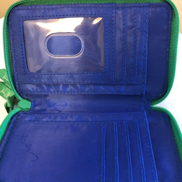 Vera Bradley cross body wallet with multiple compartments. OS - Picture 2 of 4